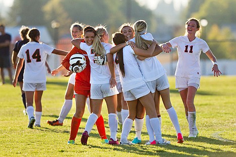 &lt;p&gt;The Post Falls High School girls soccer squad celebrates after beating Lake City Tuesday in the 5A Region 1 championship for a state playoff berth.&lt;/p&gt;