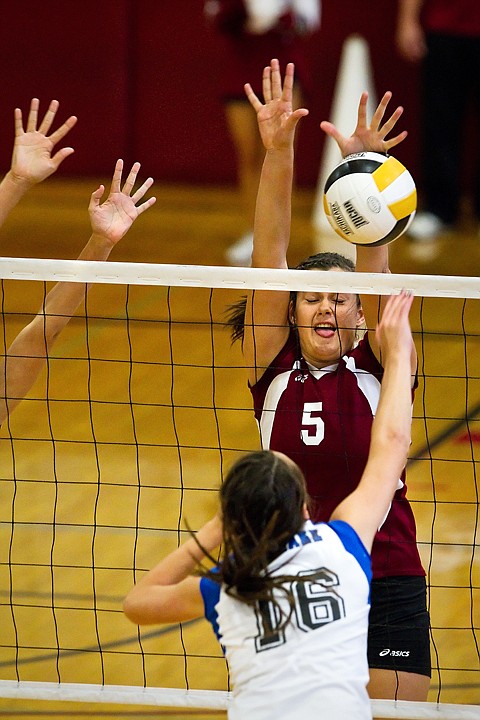 &lt;p&gt;Tina Strahinic, outside hitter for North Idaho College, blocks a hit from Salt Lake's Aurie Robinson in the first set.&lt;/p&gt;