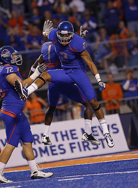 &lt;p&gt;Boise State's Austin Pettis (2) celebrates with Titus Young (1) during the first half of the NCAA college football game on Saturday, Oct. 9, 2010 in Boise, Idaho.&lt;/p&gt;