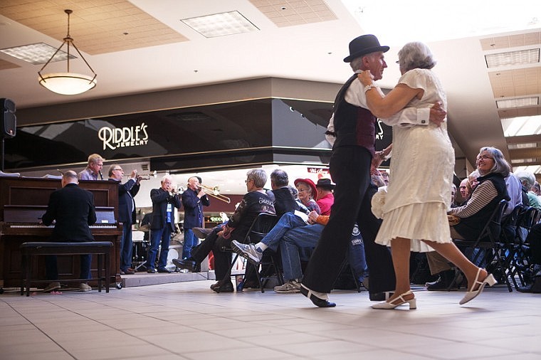 &lt;p&gt;Bob and Karen Stoltenberg dance to the music of the Yerba Buena Stompers during the opening ceremony of the Glacier Jazz Stampede at the Kalispell Center Mall on Friday afternoon.&lt;/p&gt;