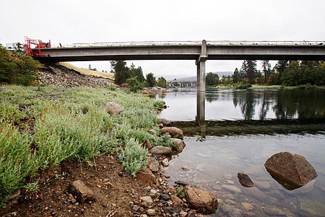 &lt;p&gt;Workers remove railings from atop the Stateline Bridge over the Spokane River as the construction efforts enter into the finals stages for the bridge reopening date of Nov. 1.&lt;/p&gt;