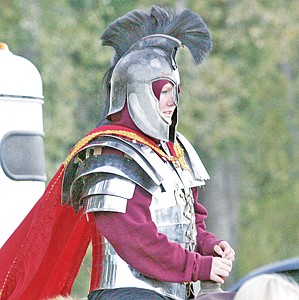 &lt;p&gt;Troy senior Breanna Opland in Trojan garb watches her Trojan football team in Friday&#146;s Homecoming game.&lt;/p&gt;