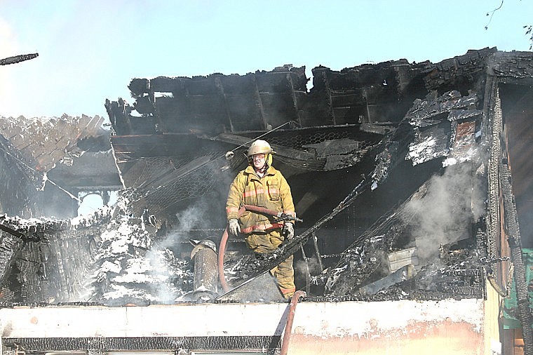 &lt;p&gt;Hot Springs VFD Chief Randy Woods shouts instructions to his crew below from what used to be the house rooftop and attic.&#160;&lt;/p&gt;