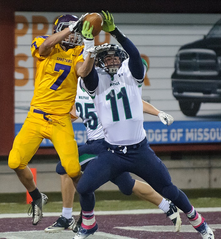 <p>Glacier’s Tucker Rauthe (11) breaks up a pass in the end zone intended for a Missoula Sentinel receiver Friday night at Washington-Grizzly Stadium in Missoula.</p>
