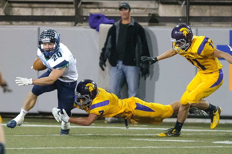 &lt;p&gt;Evan Epperly (20) runs the ball Friday night during Glacier's 59-41 victory over Missoula Sentinel at Washington-Grizzly Stadium in Missoula. Oct. 11, 2013 in Missoula, Montana. (Patrick Cote/Daily Inter Lake)&lt;/p&gt;