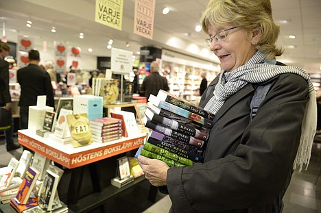 &lt;p&gt;Monica Nordberg collects an armful of books by newly announced 2013 Nobel literature prizewinner, Alice Munro of Canada, at a Stockholm bookstore Thursday Oct. 10, 2013. Customers waited for the prize announcement to be first in line.&lt;/p&gt;