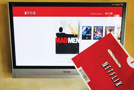 &lt;p&gt;In this Oct. 1 photo, a Netflix DVD envelope and Netflix on-screen television menu are shown in Surfside, Fla.&lt;/p&gt;