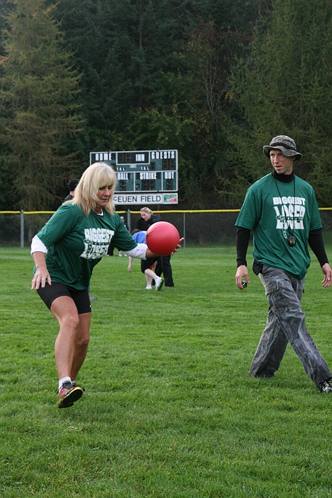 &lt;p&gt;Patricia Evans, left, of Coeur d'Alene, competes in a team relay race during the Biggest Loser Challenge on Saturday at McEuen Field. Peak Health and Wellness athletic trainer Bryan Jansen, right, offers encouragement.&lt;/p&gt;