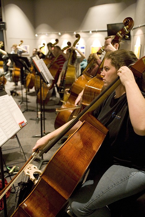 <p>CSO principal bass Kristina Phillips heads up an impressive array of low strings.</p>