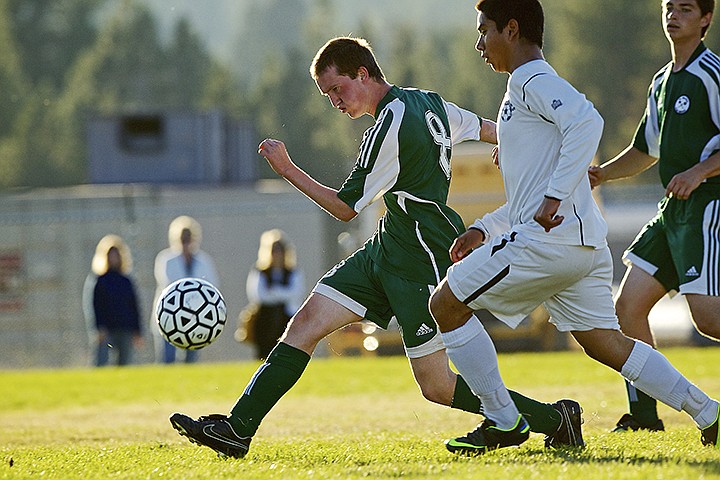 &lt;p&gt;JEROME A. POLLOS/Press St. Maries High's Victor Grogan blasts a shot toward the goal in front of Jesus Mendez from Bonner's Ferry High.&lt;/p&gt;