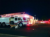 Candle started Moses Lake business fire