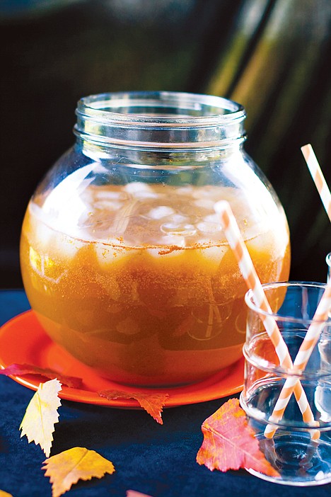 <p>This Sept. 28, 2011 photo shows pumpkin pie punch in Concord, N.H. This drink's blend of spices, apple cider and ginger ale is delicious and rich, yet still refreshing. (AP Photo/Matthew Mead)</p>