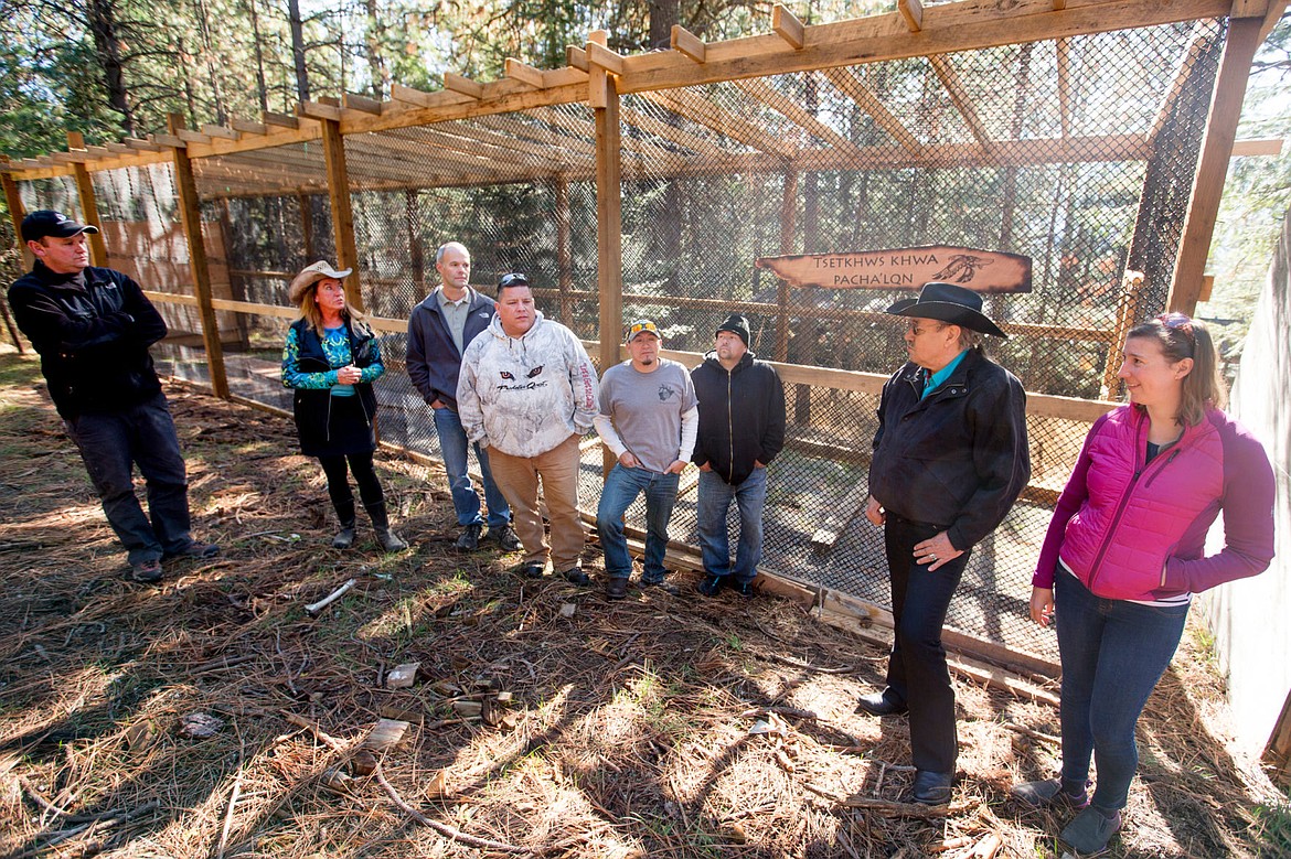 &lt;p&gt;Jane Veltkamp, members of the Coeur d'Alene Tribe, employees of U.S. Fish and Wildlife, and others talk about the Tribe's new eagle aviary, pictured behind them, on Wednesday at Birds of Prey Northwest. The aviary is the first of its kind in the Pacific Northwest.&lt;/p&gt;