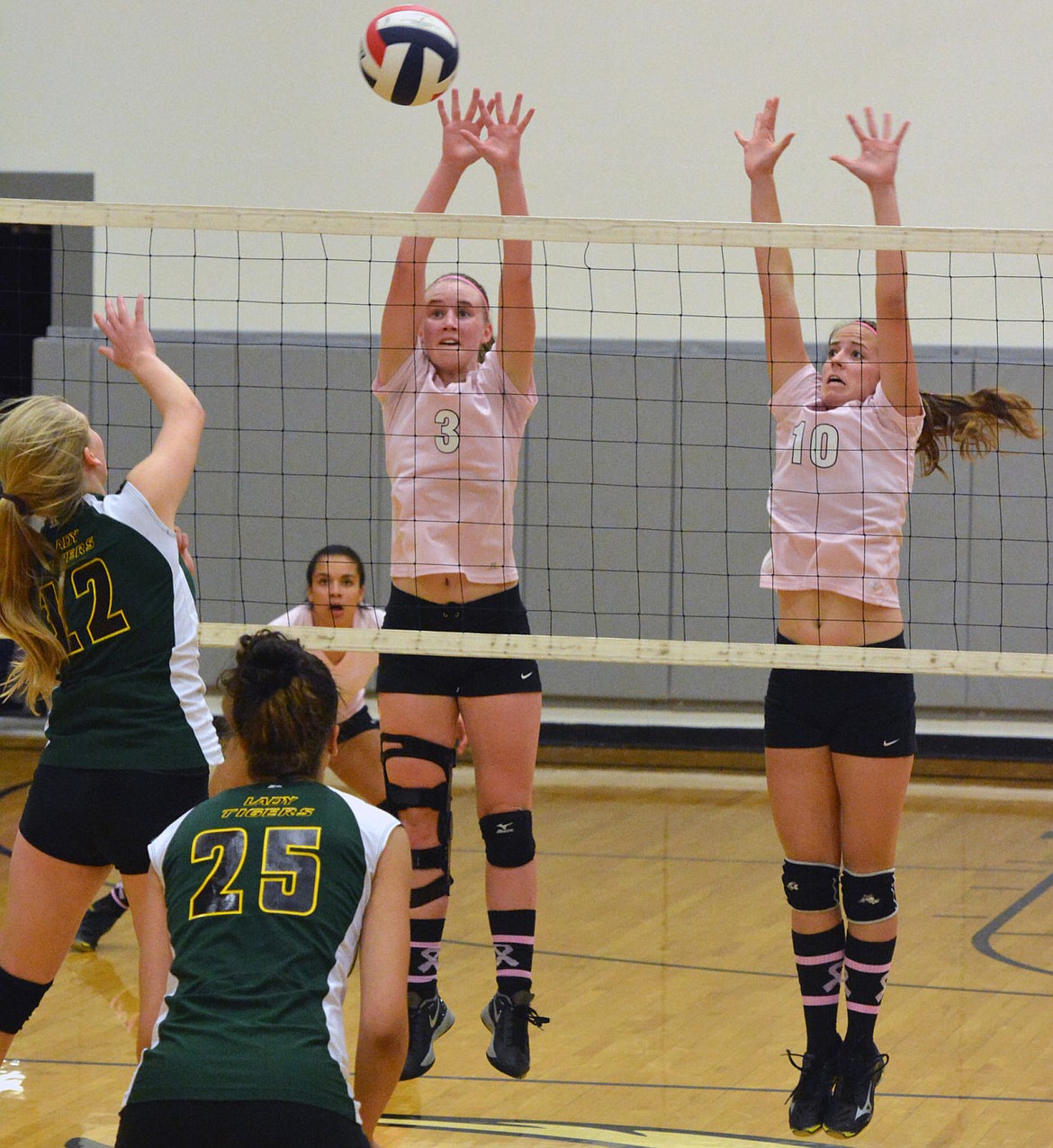 &lt;p&gt;CHARLO HIGH SCHOOL player Teaira Truman (left) and Brooklyn Foust (right) attempt a block against St. Regis&#146;s defense Thursday night at Charlo High School.&lt;/p&gt;