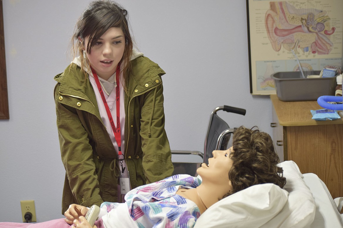 &lt;p&gt;Jackee Flores, a student in the certified nursing assistant program, demonstrates her skills on a mannequin at the Kicking Horse Job Corps Center on Oct. 5. &#160;&lt;/p&gt;&lt;p&gt;&lt;strong&gt;&#160;&lt;/strong&gt;&lt;/p&gt;