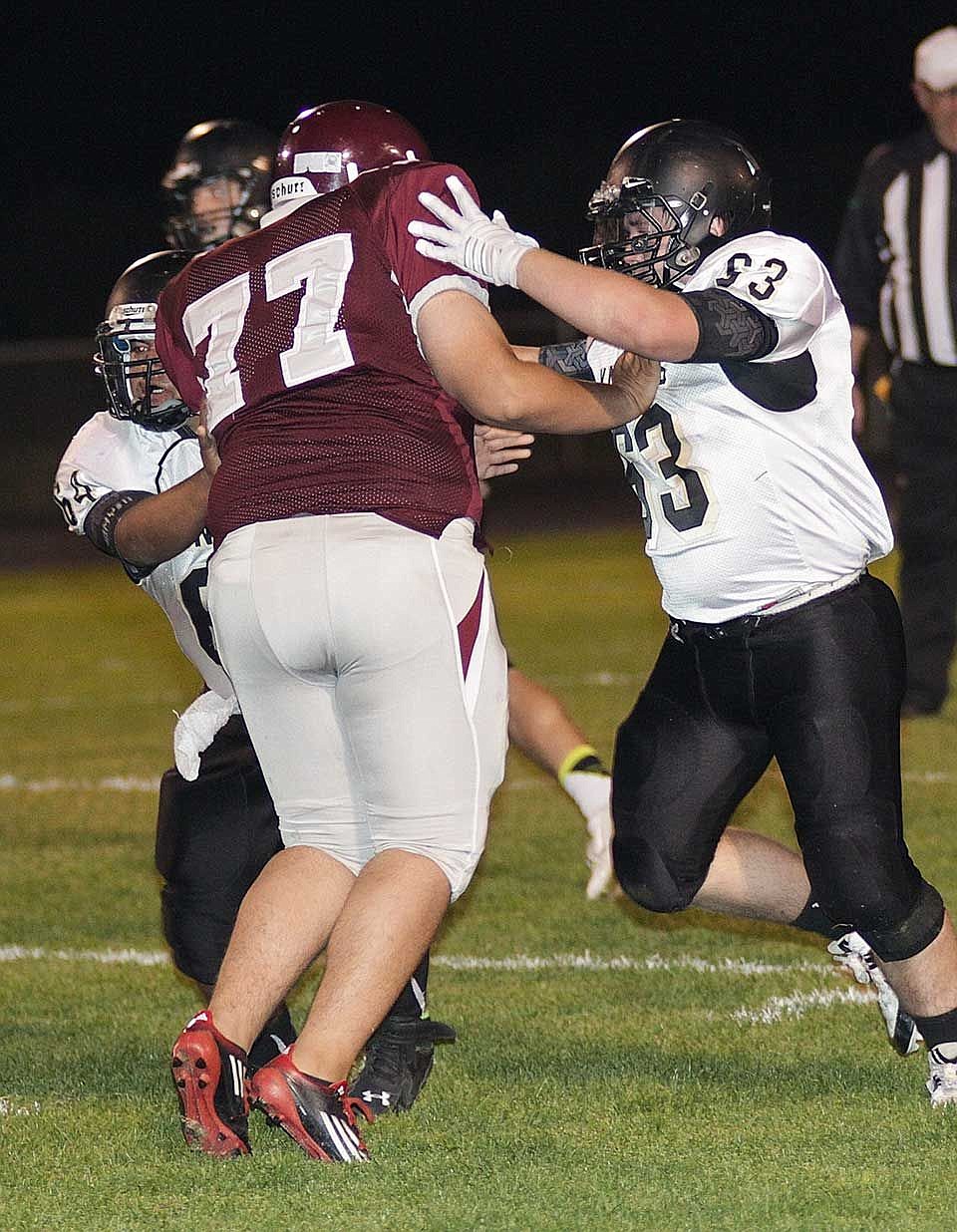 Wahluke&#146;s Gabriel Sandoval is so big at 6-feet, 270 pounds, that Royal&#146;s Hugo Ledezma and Hunter Follett have to block him in tandem.