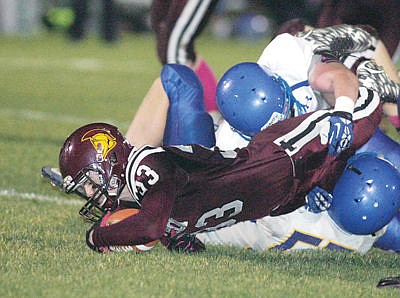 <p>Tucker Winn on the carry third quarter vs. Libby Oct. 2.</p>