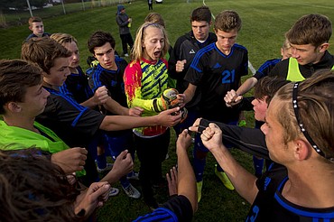 <p>The Coeur d'Alene Vikings and Lake City Timberwolves duked it out in boys soccer as they battled for the 5A Region 1 championship title on Wednesday, Oct. 12, 2016 at Lake City High School. After going into double overtime, Coeur d'Alene's Austin Garitone sneaked one past Lake City's goalkeeper, clinching the Viking's state playoff spot with a 3-2 victory. To purchase photo, please visit cdapress.com/photo</p>