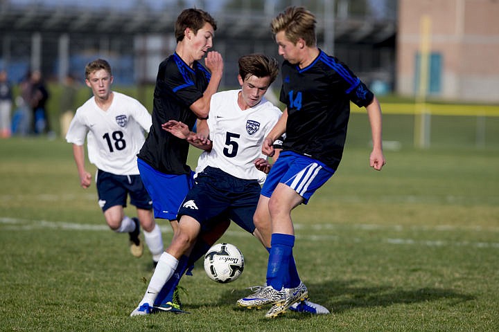 &lt;p&gt;The Coeur d'Alene Vikings and Lake City Timberwolves duked it out in boys soccer as they battled for the 5A Region 1 championship title on Wednesday, Oct. 12, 2016 at Lake City High School. After going into double overtime, Coeur d'Alene's Austin Garitone sneaked one past Lake City's goalkeeper, clinching the Viking's state playoff spot with a 3-2 victory. To purchase photo, please visit cdapress.com/photo&lt;/p&gt;