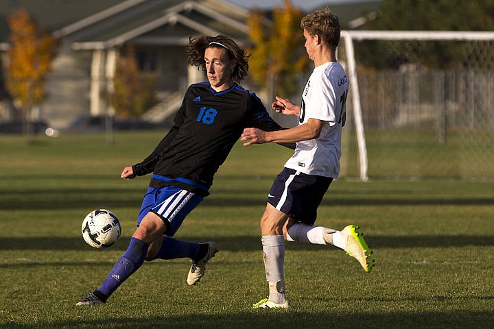 &lt;p&gt;The Coeur d'Alene Vikings and Lake City Timberwolves duked it out in boys soccer as they battled for the 5A Region 1 championship title on Wednesday, Oct. 12, 2016 at Lake City High School. After going into double overtime, Coeur d'Alene's Austin Garitone sneaked one past Lake City's goalkeeper, clinching the Viking's state playoff spot with a 3-2 victory. To purchase photo, please visit cdapress.com/photo&lt;/p&gt;