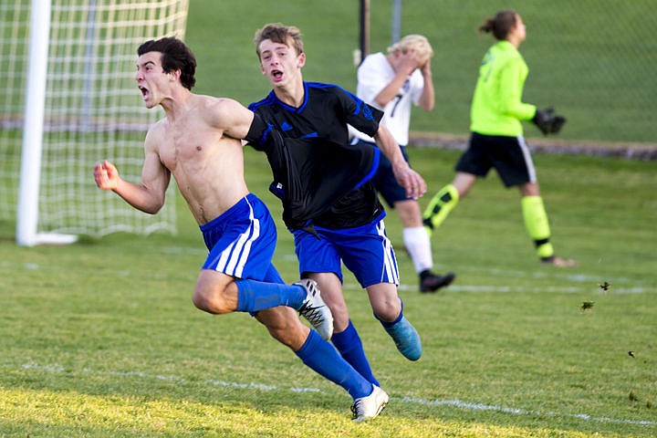 &lt;p&gt;Coeur d'Alene senior Austin Garitone celebrates shirtless after scoring the game-winning goal to end the double-overtime 5A Region 1 championship game against Lake City on Wednesday at Lake City High School. The Vikings will advance to state playoffs on the 20th at Post Falls High School.&lt;/p&gt;