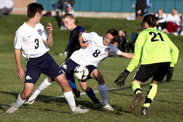 &lt;p&gt;The Coeur d'Alene Vikings and Lake City Timberwolves duked it out in boys soccer as they battled for the 5A Region 1 championship title on Wednesday, Oct. 12, 2016 at Lake City High School. After going into double overtime, Coeur d'Alene's Austin Garitone sneaked one past Lake City's goalkeeper, clinching the Viking's state playoff spot with a 3-2 victory. To purchase photo, please visit cdapress.com/photo&lt;/p&gt;