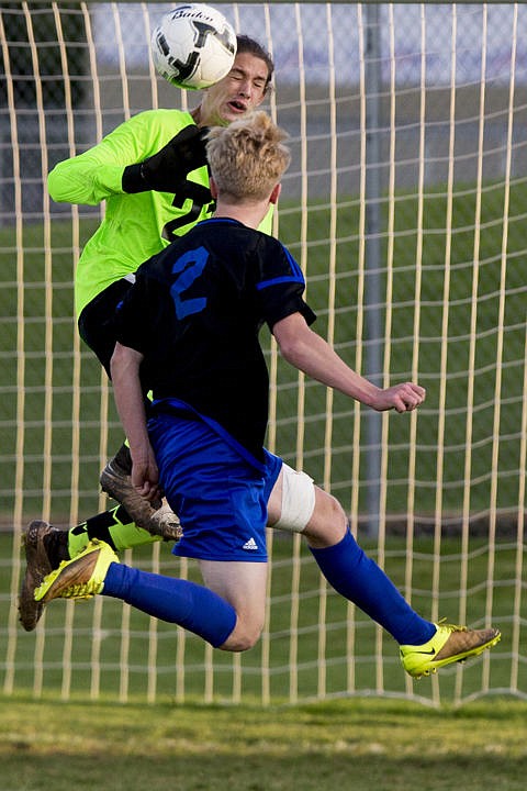 &lt;p&gt;The Coeur d'Alene Vikings and Lake City Timberwolves duked it out in boys soccer as they battled for the 5A Region 1 championship title on Wednesday, Oct. 12, 2016 at Lake City High School. After going into double overtime, Coeur d'Alene's Austin Garitone sneaked one past Lake City's goalkeeper, clinching the Viking's state playoff spot with a 3-2 victory. To purchase photo, please visit cdapress.com/photo&lt;/p&gt;