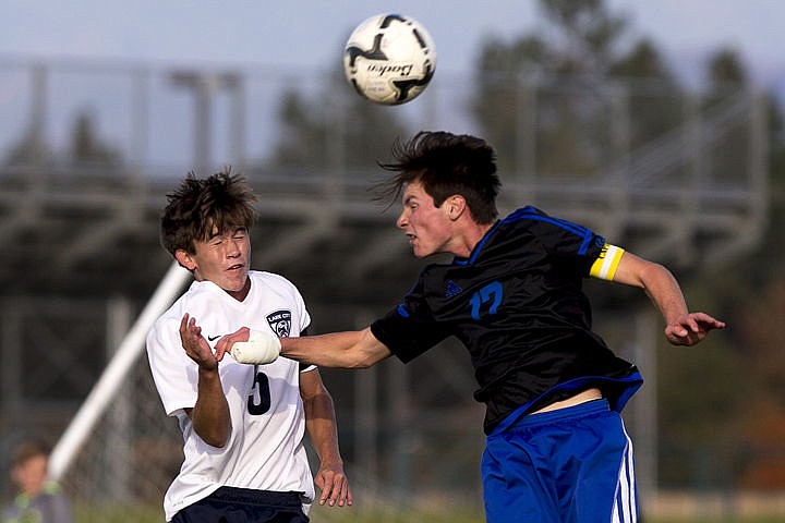 &lt;p&gt;The Coeur d'Alene Vikings and Lake City Timberwolves duked it out in boys soccer as they battled for the 5A Region 1 championship title on Wednesday, Oct. 12, 2016 at Lake City High School. After going into double overtime, Coeur d'Alene's Austin Garitone sneaked one past Lake City's goalkeeper, clinching the Viking's state playoff spot with a 3-2 victory. To purchase photo, please visit cdapress.com/photo&lt;/p&gt;