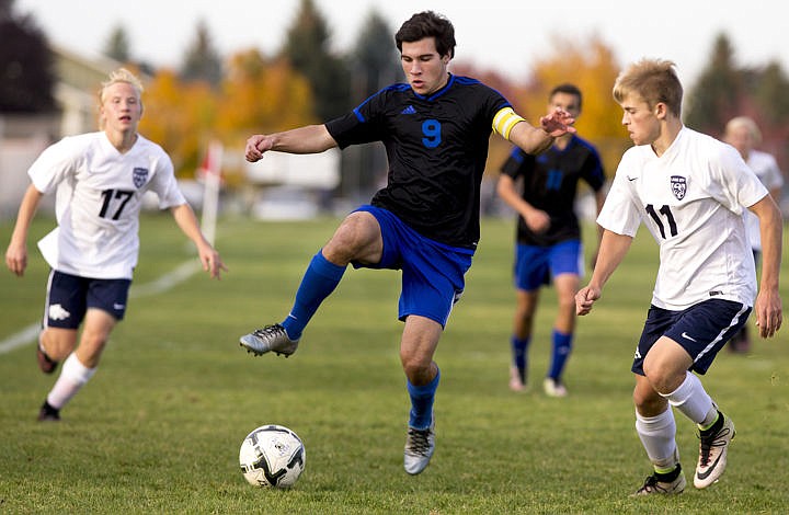 &lt;p&gt;The Coeur d'Alene Vikings and Lake City Timberwolves duked it out in boys soccer as they battled for the 5A Region 1 championship title on Wednesday, Oct. 12, 2016 at Lake City High School. After going into double overtime, Coeur d'Alene's Austin Garitone sneaked one past Lake City's goalkeeper, clinching the Viking's state playoff spot with a 3-2 victory. To purchase photo, please visit cdapress.com/photo&lt;/p&gt;