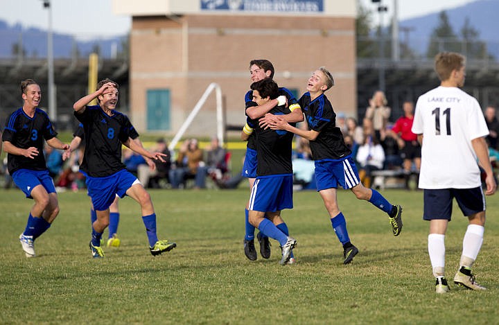 &lt;p&gt;The Coeur d'Alene Vikings and Lake City Timberwolves duked it out in boys soccer as they battled for the 5A Region 1 championship title on Wednesday, Oct. 12, 2016 at Lake City High School. After going into double overtime, Coeur d'Alene's Austin Garitone sneaked one past Lake City's goalkeeper, clinching the Viking's state playoff spot with a 3-2 victory. To purchase photo, please visit cdapress.com/photo&lt;/p&gt;