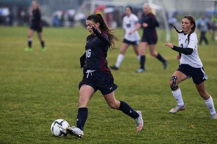 &lt;p&gt;Coeur d'Alene Charter and Timberlake High School girls soccer squads duke it out in the rain for the 3A Championship 1-2 title, Thursday, Oct. 13, 2016 at Lake City High School. Cd&#146;A Charter went up 3-1 in the 52nd minute when McAfee took a feed from Cunningham. Coeur d&#146;Alene Charter (13-3-1) will open state tourney play vs. Filer (8-4-1) next Thursday at 1 p.m. PDT at the Sunway Soccer Complex in Twin Falls.&lt;/p&gt;