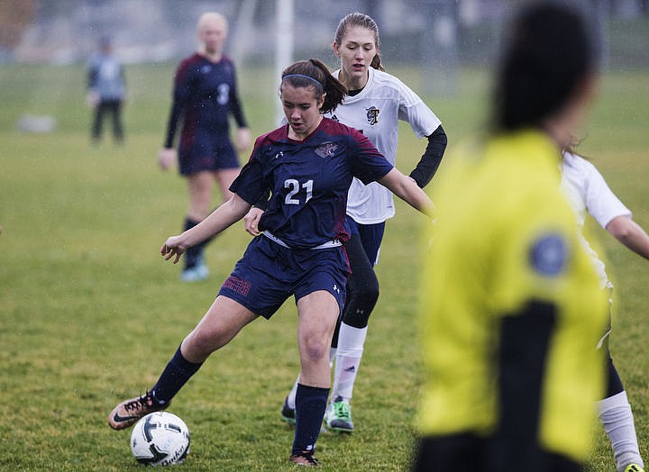 &lt;p&gt;Coeur d'Alene Charter and Timberlake High School girls soccer squads duke it out in the rain for the 3A Championship 1-2 title, Thursday, Oct. 13, 2016 at Lake City High School. Cd&#146;A Charter went up 3-1 in the 52nd minute when McAfee took a feed from Cunningham. Coeur d&#146;Alene Charter (13-3-1) will open state tourney play vs. Filer (8-4-1) next Thursday at 1 p.m. PDT at the Sunway Soccer Complex in Twin Falls.&lt;/p&gt;