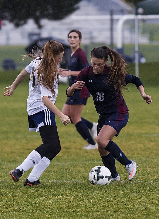 &lt;p&gt;Coeur d'Alene Charter and Timberlake High School girls soccer squads duke it out in the rain for the 3A Championship 1-2 title, Thursday, Oct. 13, 2016 at Lake City High School. Cd&#146;A Charter went up 3-1 in the 52nd minute when McAfee took a feed from Cunningham. Coeur d&#146;Alene Charter (13-3-1) will open state tourney play vs. Filer (8-4-1) next Thursday at 1 p.m. PDT at the Sunway Soccer Complex in Twin Falls.&lt;/p&gt;