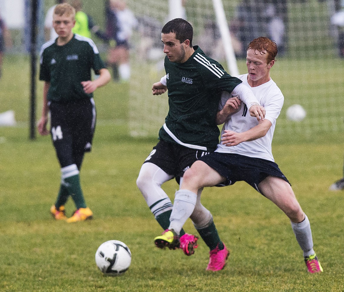 &lt;p&gt;LOREN BENOIT/Press St Maries' Diego Papetti (12) fends off Bonners Ferry midfielder Ethan Wilson (11) during the 3A District 1-2 championship game on Thursday at Lake City High School.&lt;/p&gt;