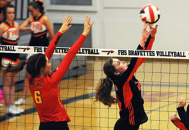 &lt;p&gt;Flathead's Xio Lopp sets up her teammate for a kill during the first game against Missoula Hellgate at Flathead on Tuesday. (Aaric Bryan/Daily Inter Lake)&lt;/p&gt;