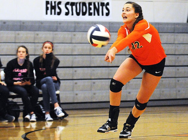 &lt;p&gt;Flathead libero Jourdon Schultz digs out a ball against Missoula Hellgate on Tuesday. (Aaric Bryan/Daily Inter Lake)&lt;/p&gt;