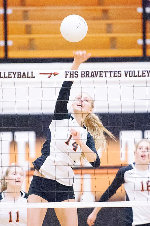 &lt;p&gt;Flathead's Timi Severson (14) spikes the ball Tuesday night during Flathead's win over Missoula Sentinel at Flathead High School. Oct. 8, 2013 in Kalispell, Montana. (Patrick Cote/Daily Inter Lake)&lt;/p&gt;