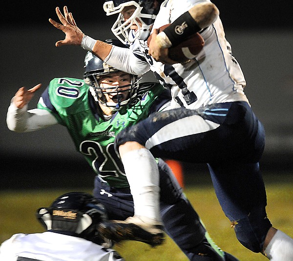 &lt;p&gt;Glacier defensive back Evan Epperly (20) moves in to tackle
Great Falls running back Robert Hubka (21) during first-half play
Friday night.&lt;/p&gt;