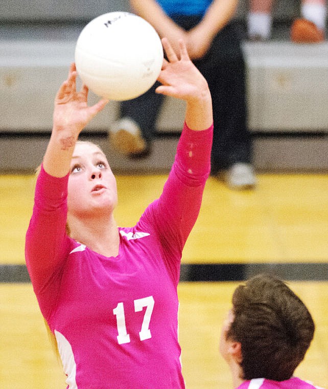 &lt;p&gt;Junior Jessica Simmons sets the ball Tuesday night during Flathead's home victory over Missoula Hellgate. Oct. 15, 2013 in Kalispell, Montana. (Patrick Cote/Daily Inter Lake)&lt;/p&gt;