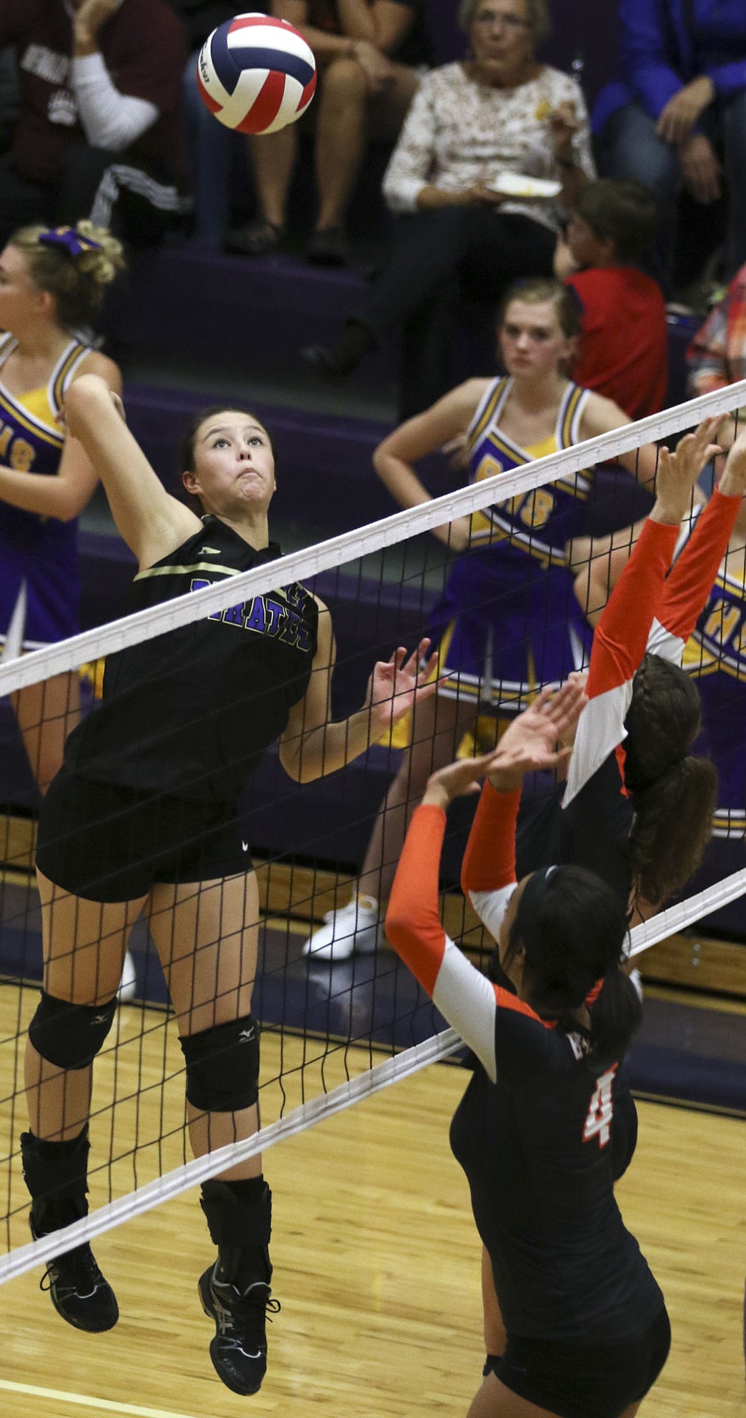 &lt;p&gt;Polson's Haley Fyant looks to spike the ball against Frenchtown defenders on Thursday night in Polson.&lt;/p&gt;