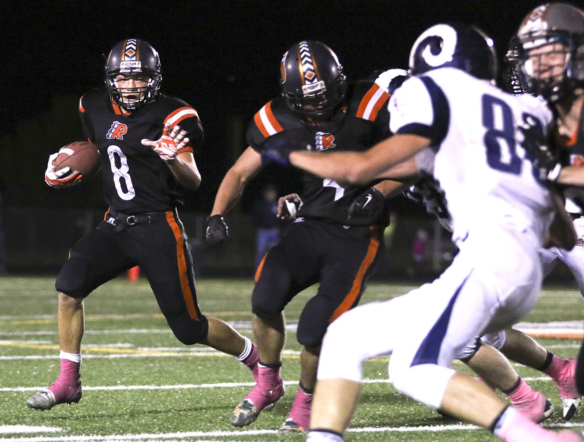 &lt;p&gt;Ronan's Brendon Blood runs the ball during their game Loyola on Friday night.&lt;/p&gt;