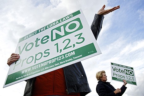 &lt;p&gt;Mamie Geib, right, and Bette Price, show their support for voting no against the proposed &quot;Luna Laws&quot; as they try to urge voters to do the same near the MidTown Center in Coeur d'Alene where the Coeur d'Alene School District board took their position on the propositions Monday.&lt;/p&gt;