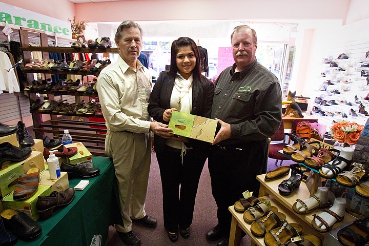 &lt;p&gt;JJ's Shoes and Boutique and Naot Footwear USA present North Idaho Violence Prevention Center with a donation of women's shoes valued at approximately $12,000. From left, John Shults, owner of JJ's Shoes, Sandra Lopez, education and outreach worker for North Idaho Violence and Prevetnion Center, and Gary Morgan, sales representative for Naot Footwear.&lt;/p&gt;