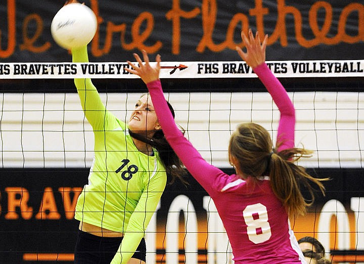 &lt;p&gt;Glacier's Katie Wiley (18) blasts the ball past Flathead's Jordyn Clare in the Wolfpack's 3-1 victory. (Aaric Bryan/Daily Inter Lake)&lt;/p&gt;