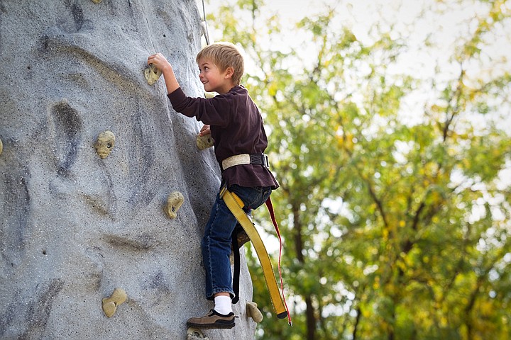 &lt;p&gt;SHAWN GUST/Press First-grader at Lighthouse Christian Academy, Christian Michaelson, makes his way up a 32-foot rock climbing column Tuesday during a physical education class. The climbing wall, one of four used statewide by Idaho National Guard recruiters, was set up for nearly 70 students to climb throughout the day.&lt;/p&gt;