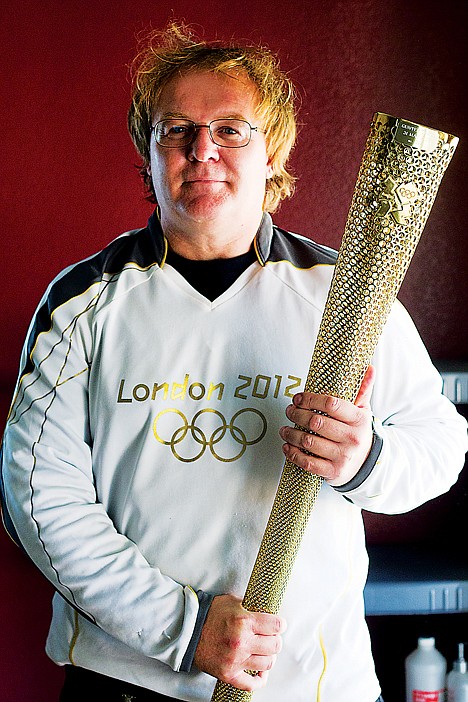 &lt;p&gt;Kane Gunter, of Knutsford, Cheshire, England, with the torch he carried in May as part of the 2012 Olympics in London.&lt;/p&gt;