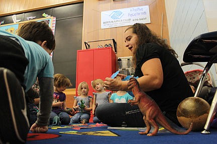 &lt;p&gt;Substitute Little Cherries instructor Desiree Alexander reads a dinosaur story to the kids. Alexander is a busy woman. She is the Parent and Teacher Organization president at Cherry Valley and the secretary at Linderman Elementary School. She was subbing for Sarah Lamphere on Oct. 10.&lt;/p&gt;