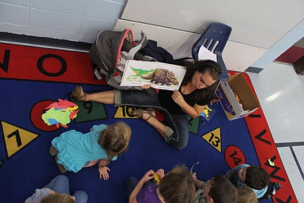 &lt;p&gt;Substitute Little Cherries instructor Desiree Alexander reads a dinosaur story to the kids. Alexander is a busy woman. She is the Parent and Teacher Organization president at Cherry Valley and the secretary at Linderman Elementary School. She was subbing for Sarah Lamphere on Oct. 10.&lt;/p&gt;