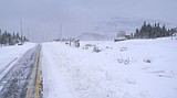 Glacier reopens, but snow closes Logan Pass