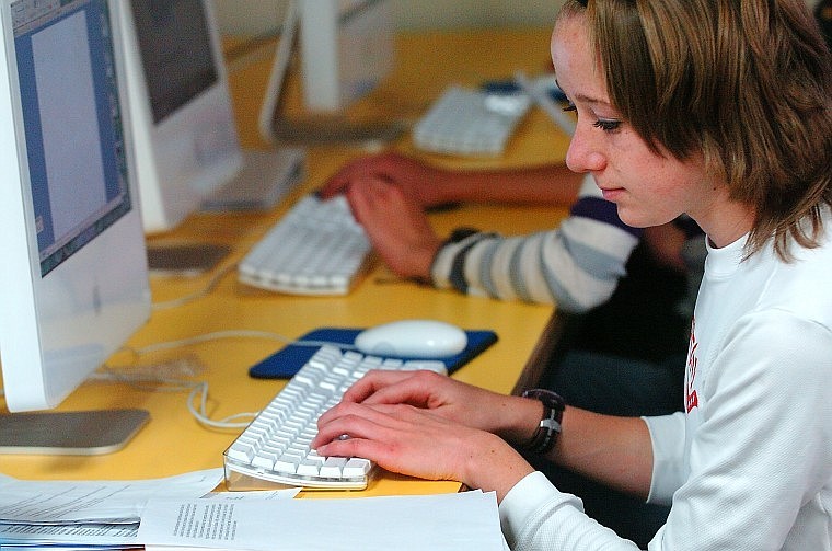 Bigfork senior Kayla Carlson works on some homework for one of her online courses. &#147;It&#146;s a great opportunity for students to meet other students from across the state,&#148; Carlson said of the program.